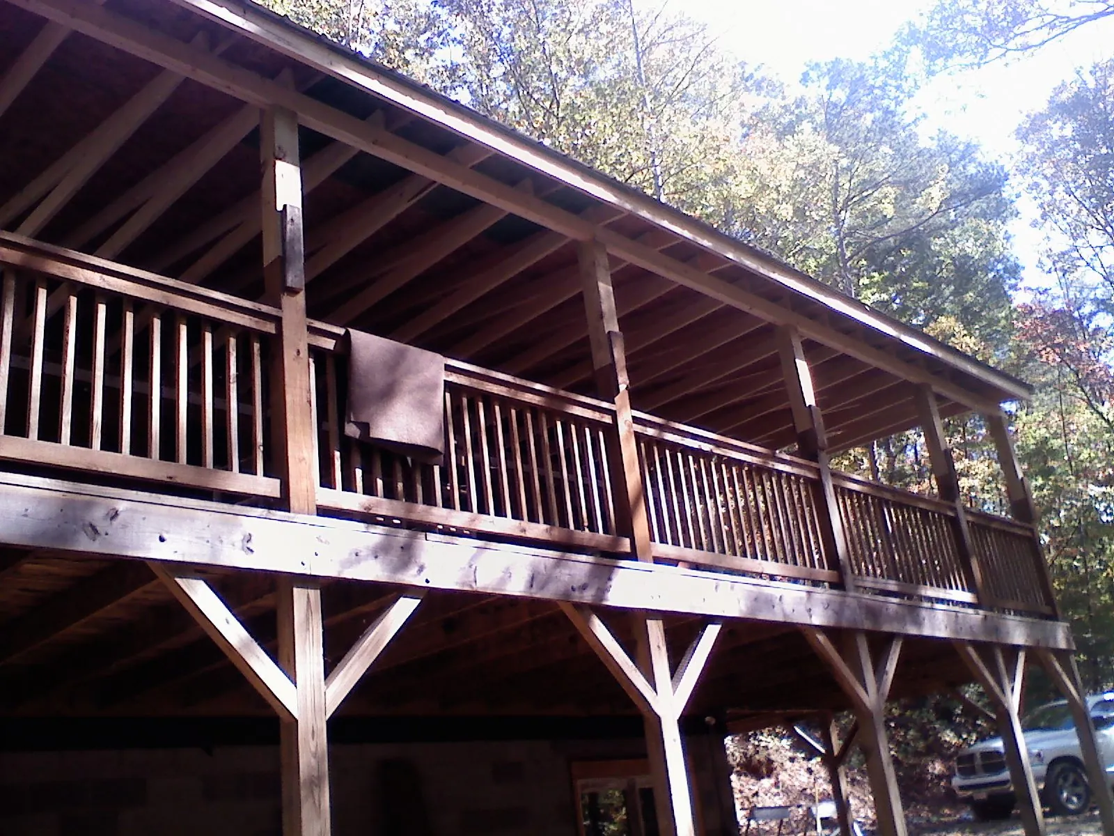 Timber framing under a new elevated porch and deck — Roof Leak Repair in Henryetta by Roofing Brothers